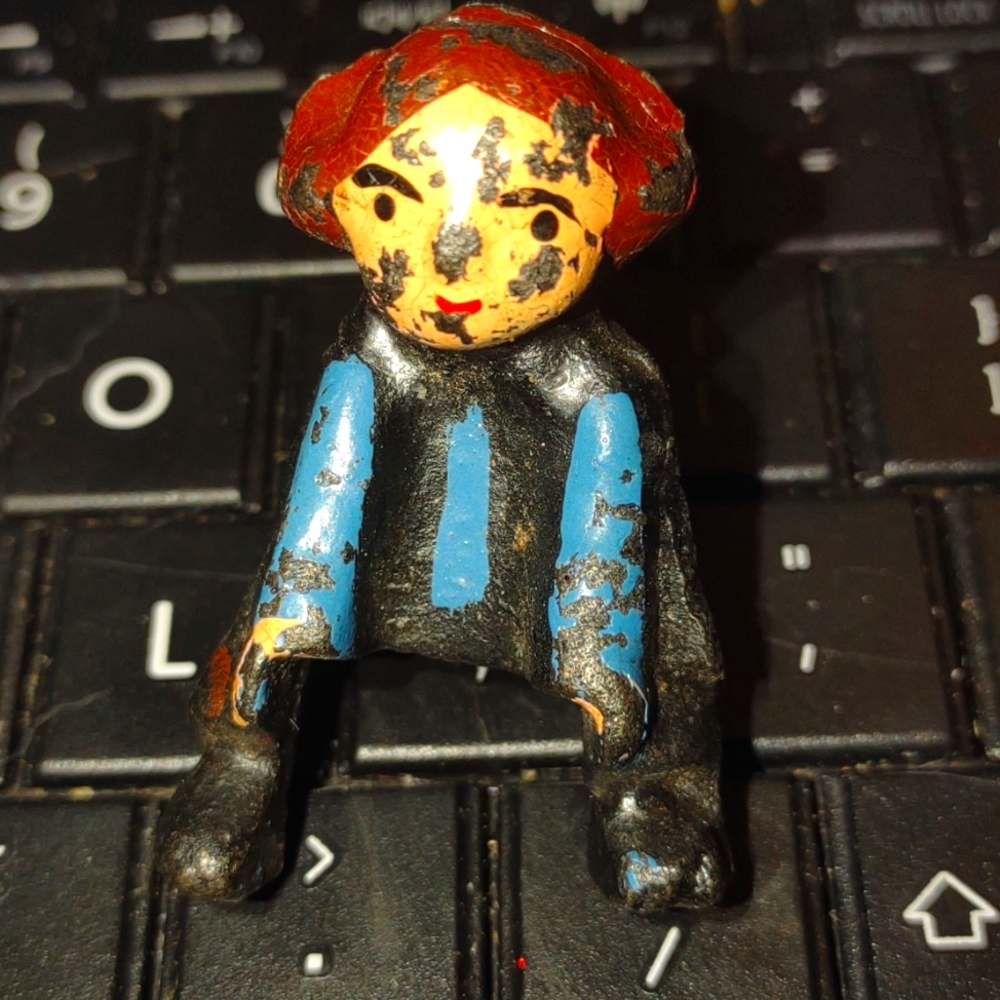 1920s extremely old metal action figure of a little girl